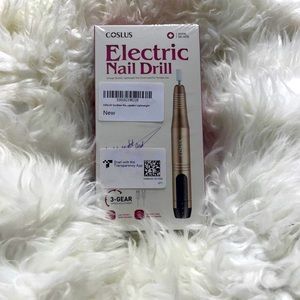 Electric nail drill includes cuticle oil